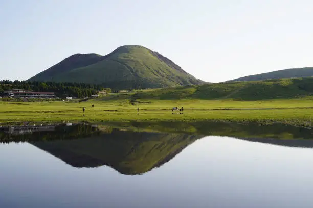 Scenery of Mt. Aso reflecting on the water surface