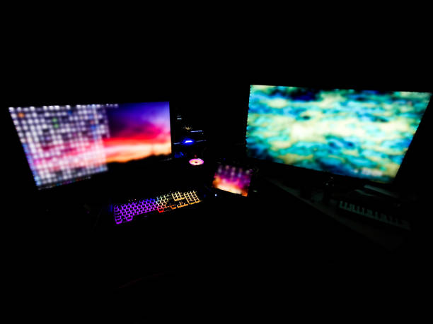 istock battle station gaming rig with multiple monitors for gamers coders miners designers renderers in a dark room with rgb lights on 1147016940