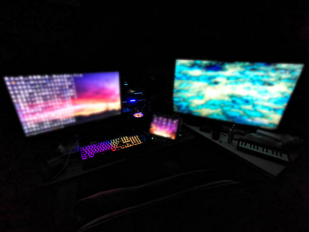 istock battle station gaming rig with multiple monitors for gamers coders miners designers renderers in a dark room with rgb lights on 1147017081