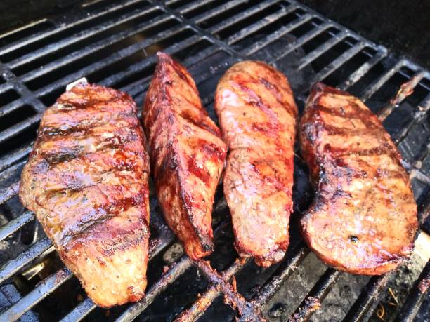 istock Sirlion steak on the hot grill - Summer BBQ 1147018766