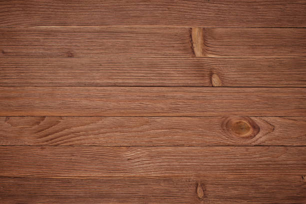 istock Overhead view of wooden table, background texture 1147018857