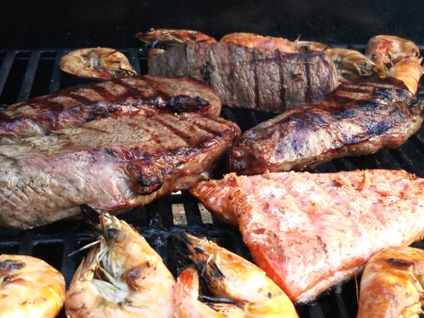 istock Sirlion steak and prawn on the grilled - Summer BBQ 1147019523