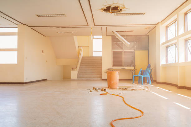 istock water leak drop interior office building in red bucket from gypsum ceiling and flow on terrazzo floor 1147021501