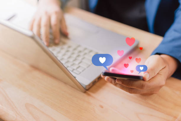 istock business man hand using smartphone with Social media concept. 1147024358