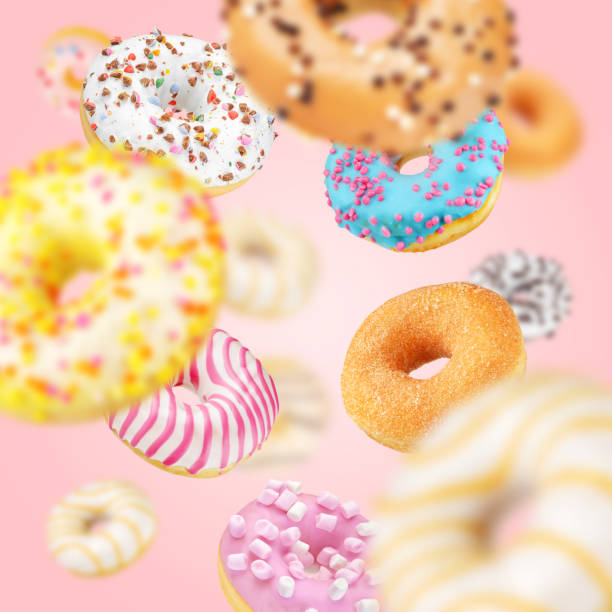 istock Lot of multicolored donuts 1147029322