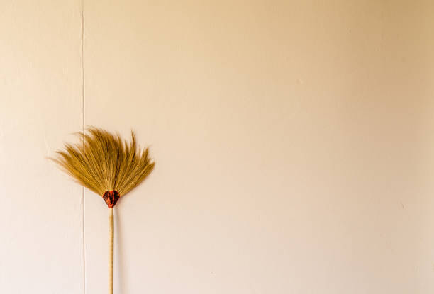 istock Hand made broom on the old background 1147031279