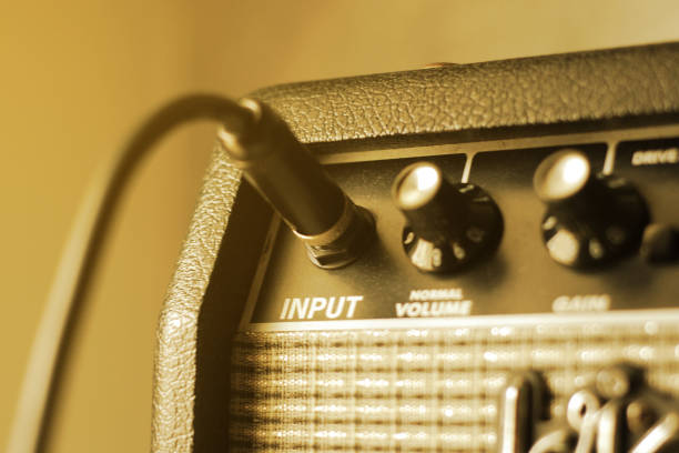 istock guitar amplifier with cable audio jack, warm tone 1147038301