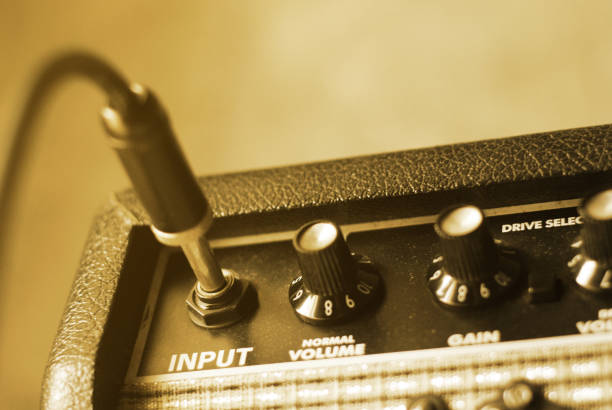 istock guitar amplifier with cable audio jack, warm tone 1147038308