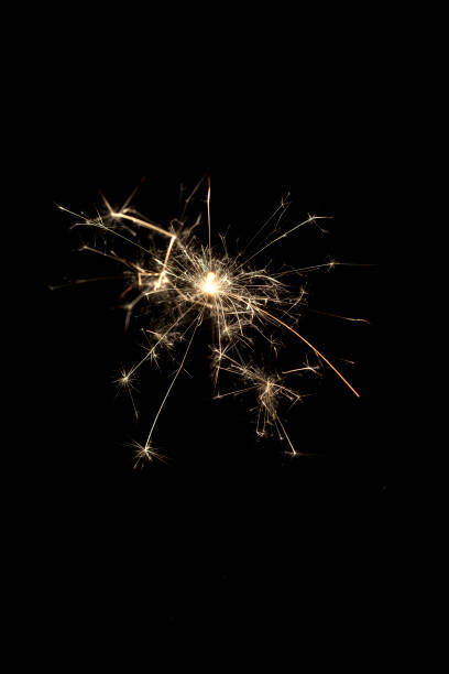 istock Burning squib on a black background with sparks. 1147040750