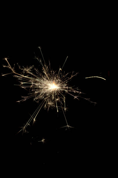 istock Burning squib on a black background with sparks. 1147040775