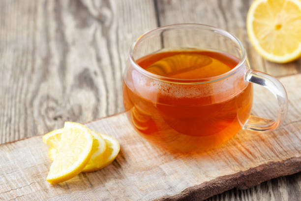 istock A glass cup of tea with lemon. 1147049517