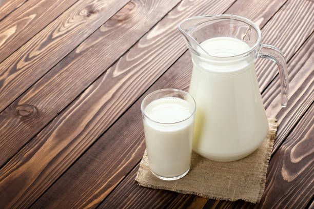 istock milk in glass and jug 1147050955