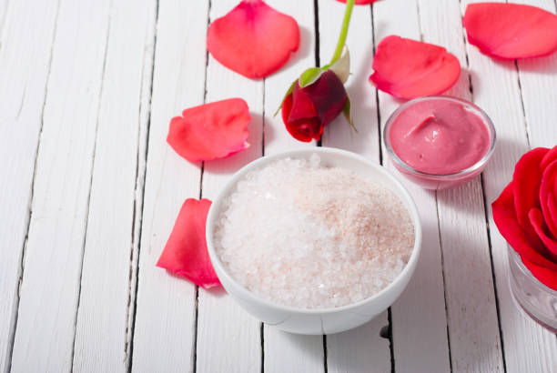 istock Cosmetics and red rose flower 1147051130