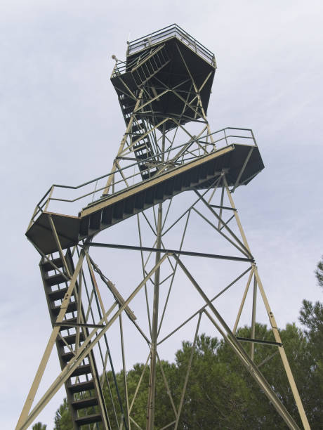 istock Low angle view of an old rusty steel forest fire lookout tower. 1147060450