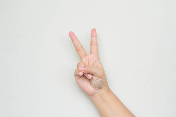istock female hand on the white background 1147062046