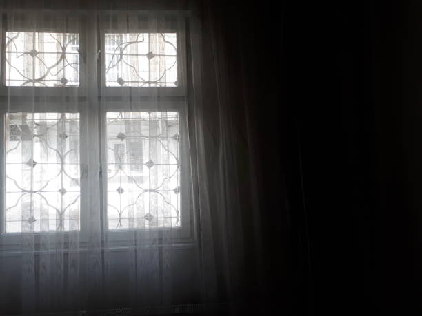istock Dark Room and Luminous Window 1147065136
