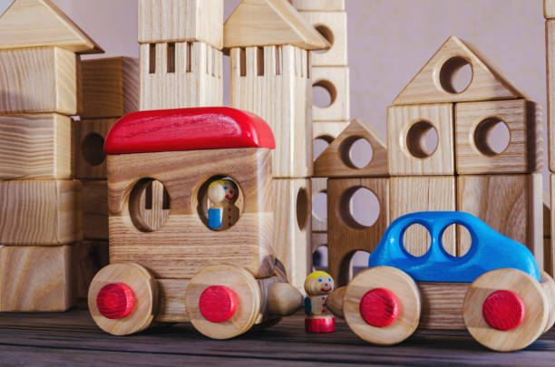 istock Wooden toys, typewriter with trailer and passengers 1147065273