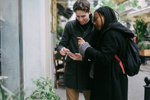 istock Young couple, window shopping 1147065644