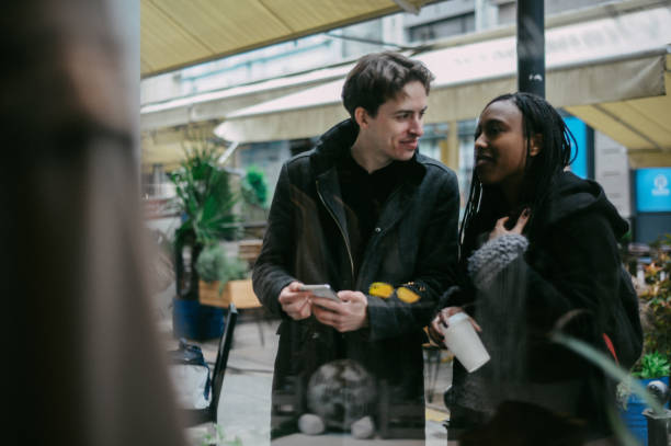 istock Young couple, window shopping 1147066260