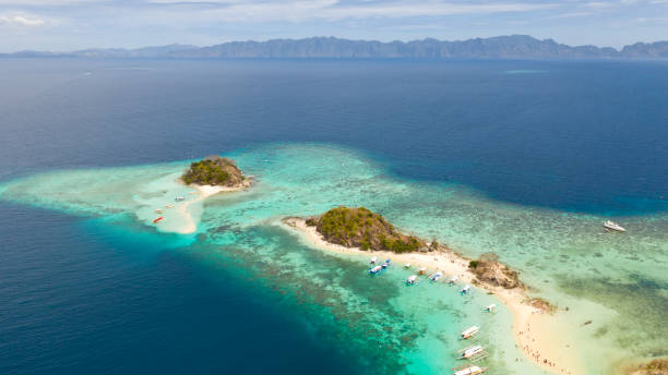 istock Islands with white beaches and azure sea 1147066348