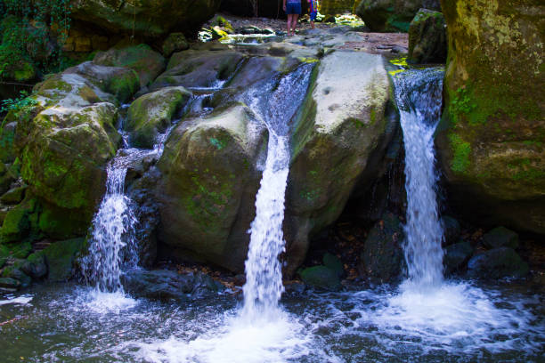 istock Schiessentumpel or Scheissendempel Waterfall in Mullerthal, Luxembourg 1147067565