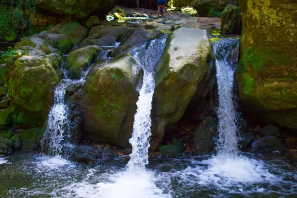 Photo of Schiessentumpel or Scheissendempel Waterfall in Mullerthal, Luxembourg