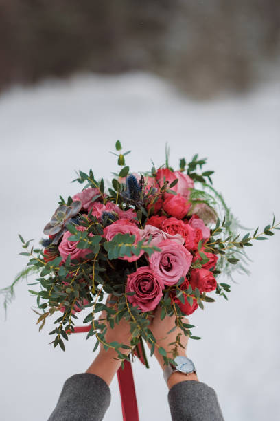 istock Wedding bouquet in a rustic style in the hands 1147067803