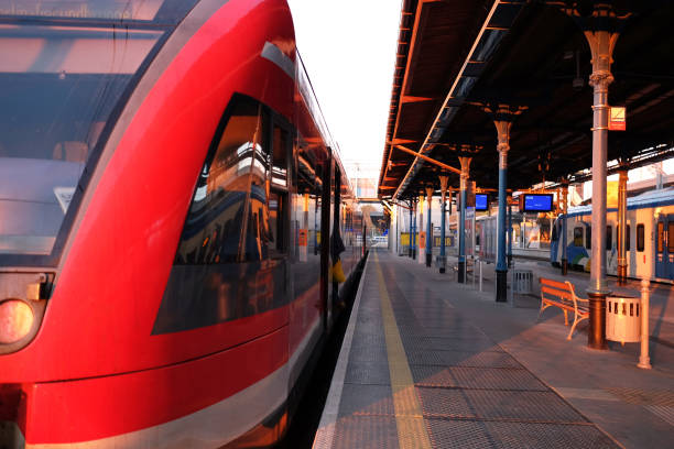 istock railway station with trains in sunset or sunrise light 1147068134