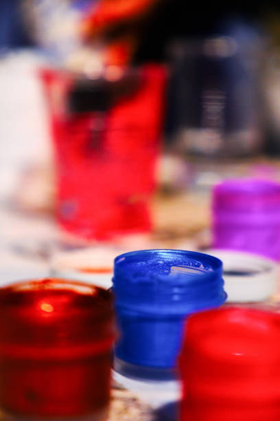 istock Open jars of gouache ready for creativity 1147068315