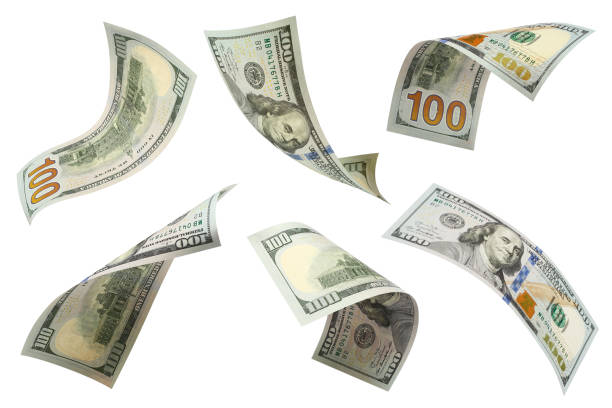 banconote da 100 dollari su bianco - flying money foto e immagini stock