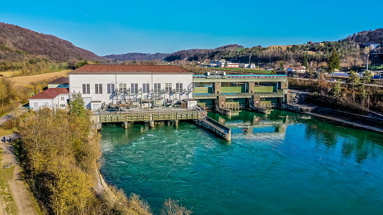Reckingen, Switzerland - March 23, 2019: The Reckingen hydropower plant is one of countless hydroelectric power plants on the Upper Rhine. The power plant was built between 1938 and 1941, during World War II. Today, the power plant is still in operation. Germany and Swiss energy companies each share half of the shares.