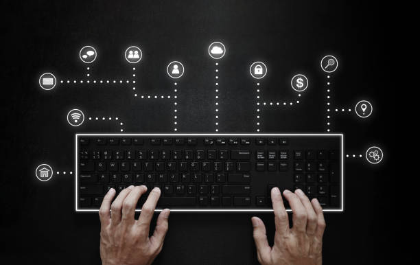 Hand typing on computer keyboard with application programming interface icons Hand typing on computer keyboard with application programming interface icons application programming interface photos stock pictures, royalty-free photos & images