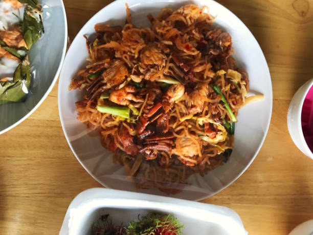 istock Thai food on a plate, placed on a wooden table 1147079837