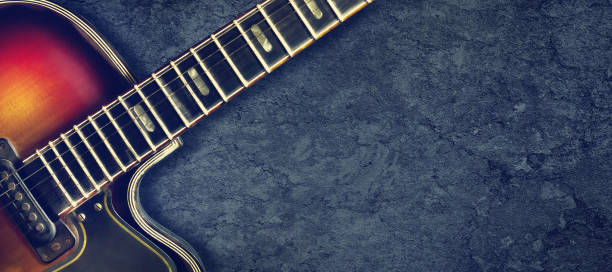 istock Old jazz electro guitar on a dark background. Close up. Copy space. Background for music festivals, concerts. Music background. 1147083796