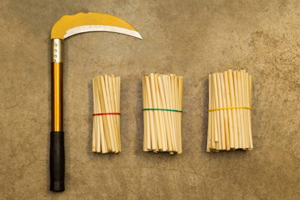 istock Yellow sickle on gray concrete floor 1147085730
