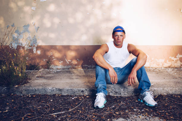 istock Young Man In Urban Setting posing in abandoned place. 1147087094