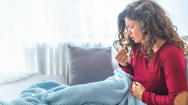 istock Woman suffering from PMS and critical days 1147087431