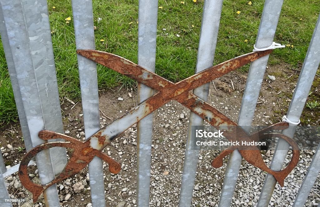 Swords gate A steel gate with swords on the Battle of the Boyne public walkway in County Meath, Ireland. Army Stock Photo
