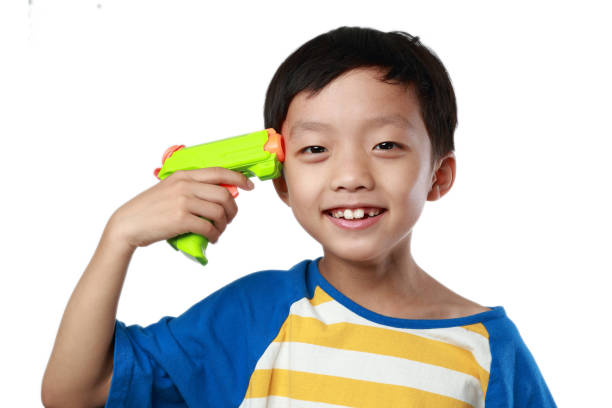 Children playing with toy guns