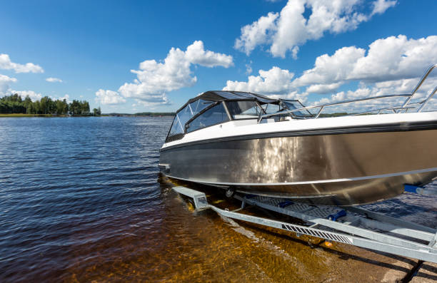 istock Boat launch on lake water from trailer 1147088462