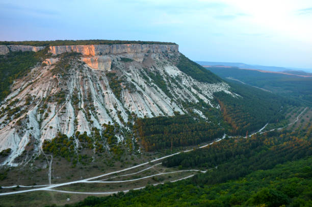 istock View from the cave town Chufut-Kale on a flat mountain in the sunset light 1147088800