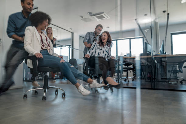 istock Coworkers having fun in the office 1147089398