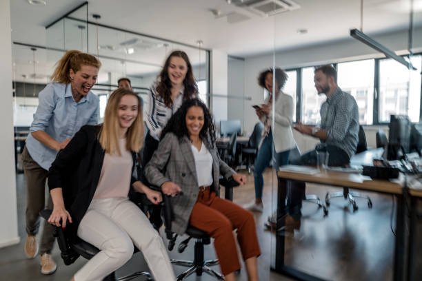 istock Coworkers having fun in the office 1147089404