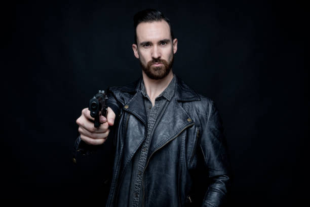 istock Man holding drugs and cash 1147092504