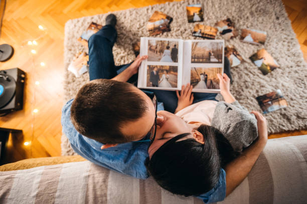 istock Looking at wedding photos 1147095022