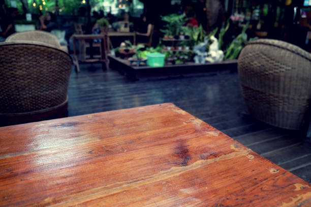 wood table on blur of cafe, coffee shop, bar, resturant, backgro stock photo