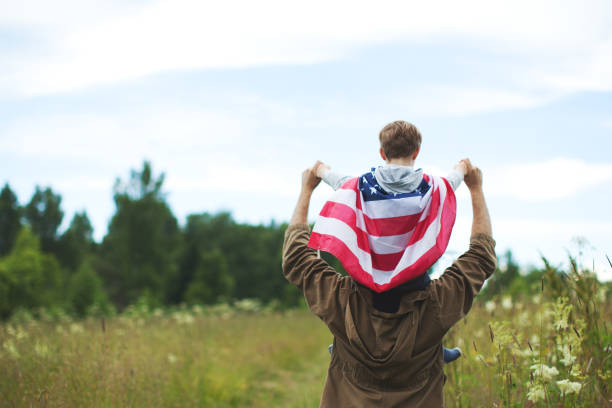 istock Father with son celebrating Independence day 1147099703