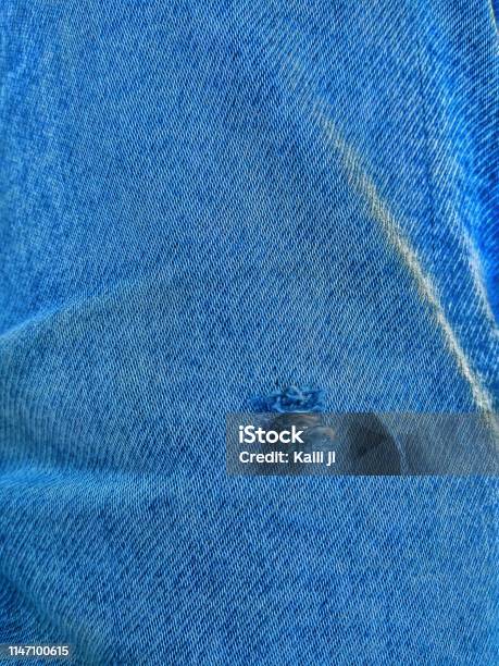 The Texture Of Blue Jeans The Denim Fabric For The Background Stock Photo - Download Image Now