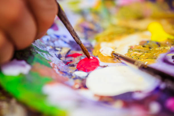 istock Painting artwork: paint brushes on painting background 1147106684