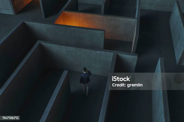 Young Businessman Lost In Maze Stock Photo - Download Image Now - Ignorance, Uncertainty, Communication Problems